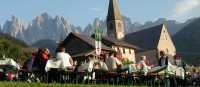 The speck festival of Santa Maddalena in the Funes Valley